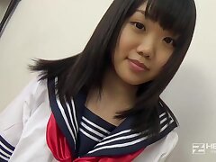 Young Asian girl Natsuno Himawari in schoolgirl outfit gives oral pleasure and gets fucked